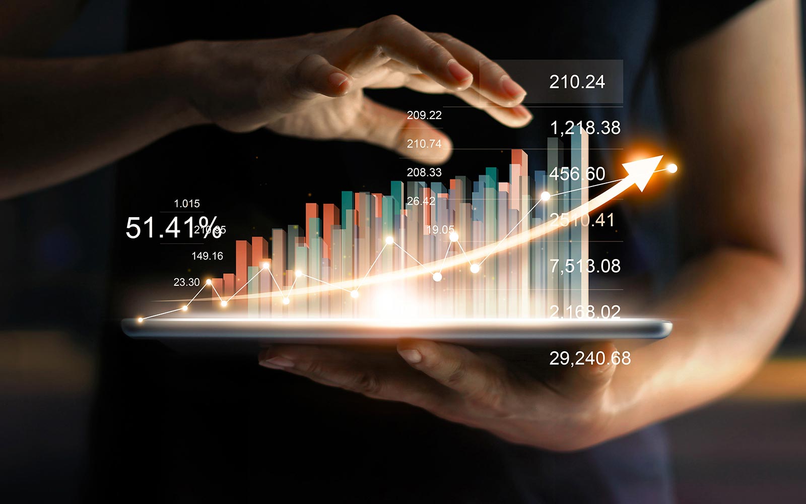 Person holding a tablet with a bar graph coming out of it